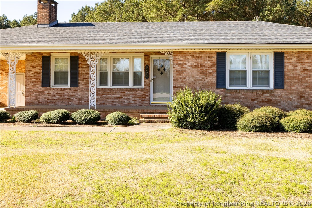 5424 Bonnetsville Road Clinton, NC 28328 - Photo 3 of 29 a front view of a house with a yard