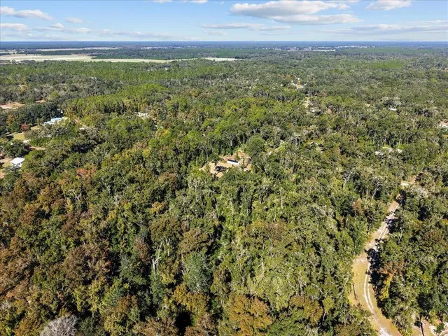 a view of a field with an outdoor space