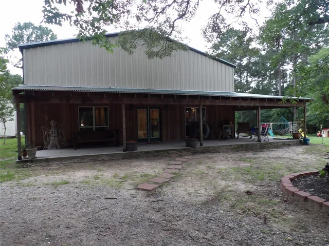 a view of a car is parked in front of house
