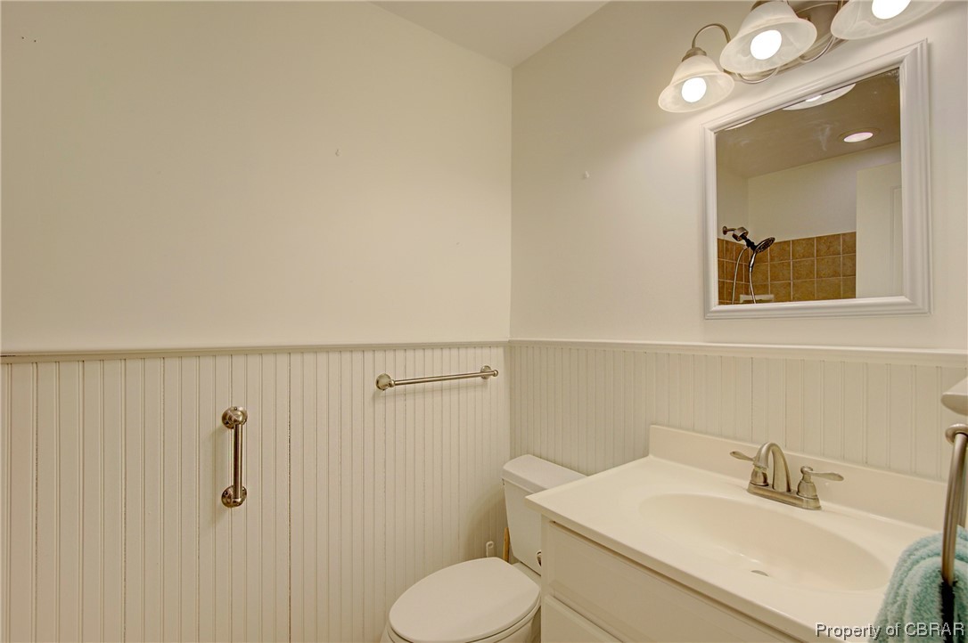 1373 Fitchetts Wharf Road Moon, VA 23119 - Photo 13 of 22 Bathroom featuring toilet and vanity