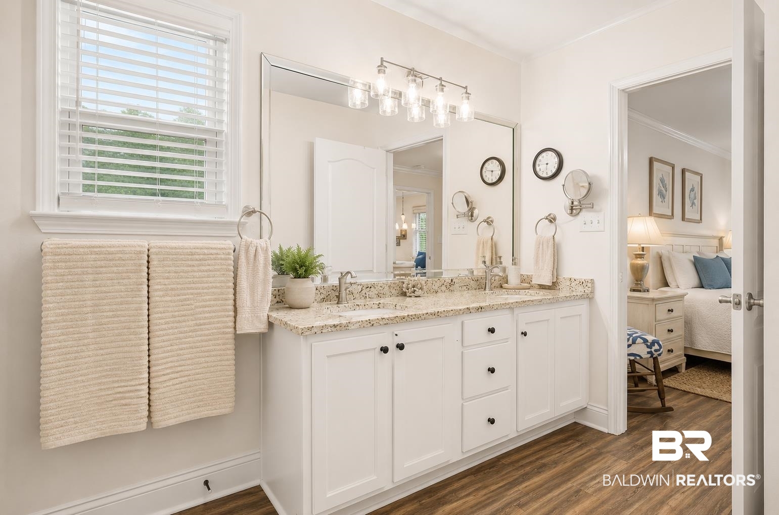 562 Vestige Mews Foley, AL 36535 - Photo 27 of 54 AI Edited Image: Double vanity with a light-toned countertop, dual sinks, and under-cabinet storage