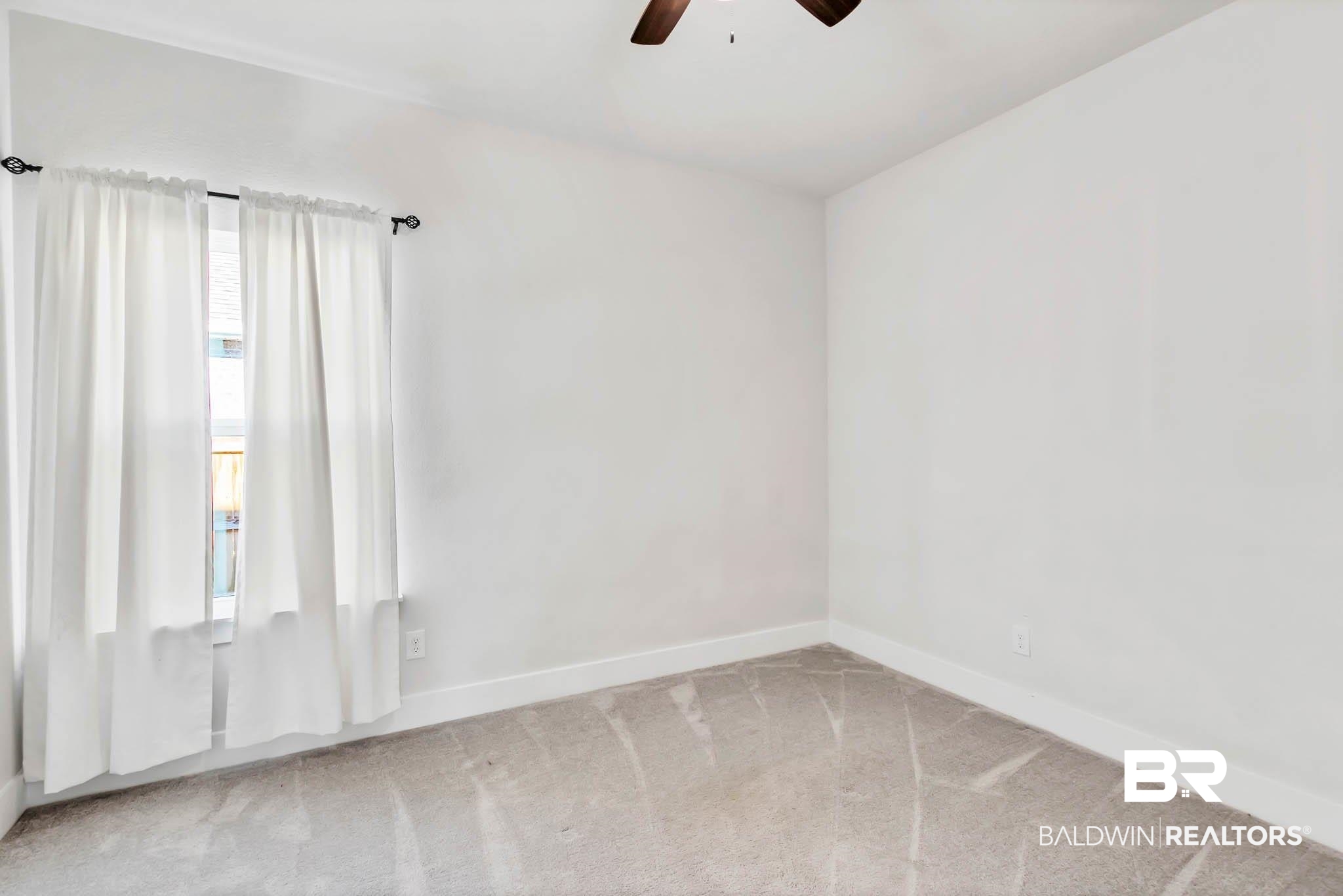 16461 Prado Loop Loxley, AL 36551 - Photo 34 of 78 Spare room with ceiling fan and light colored carpet