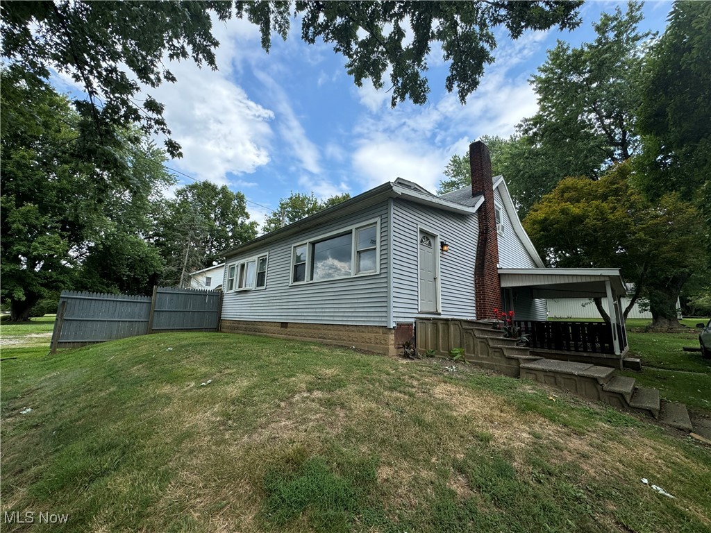 1920 South River Road Zanesville, OH 43701 - Photo 1 of 21 View of side of property with a lawn