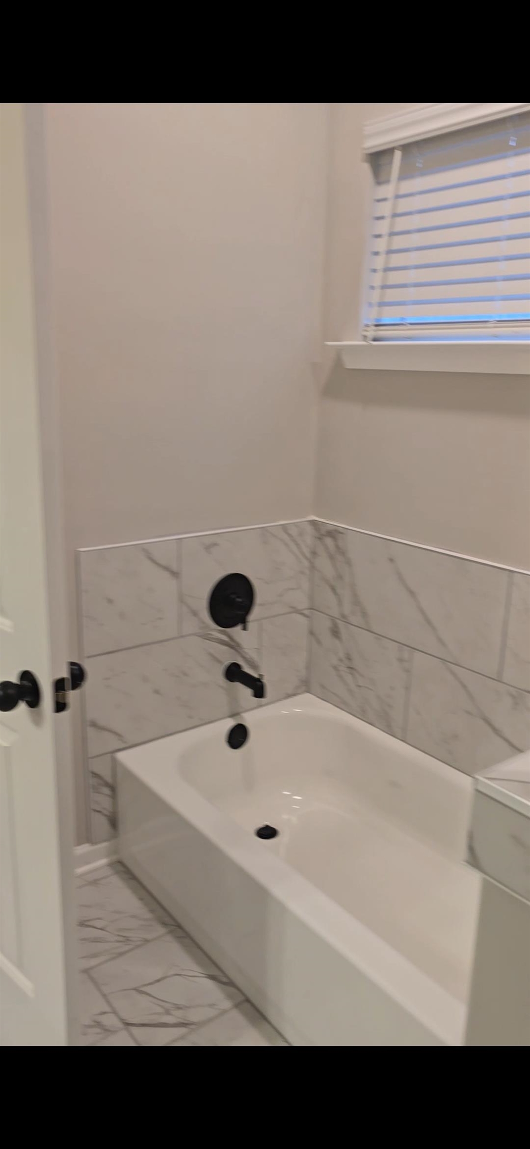 10160 Sterling Ridge Drive Cordova, TN 38018 - Photo 13 of 35 a bathroom with a bathtub