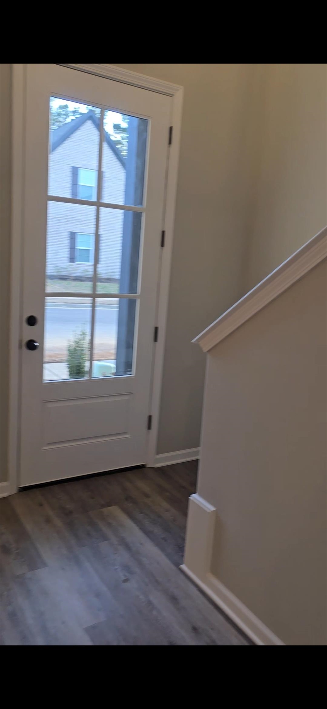 10160 Sterling Ridge Drive Cordova, TN 38018 - Photo 15 of 35 a view of an empty room with wooden floor and a window