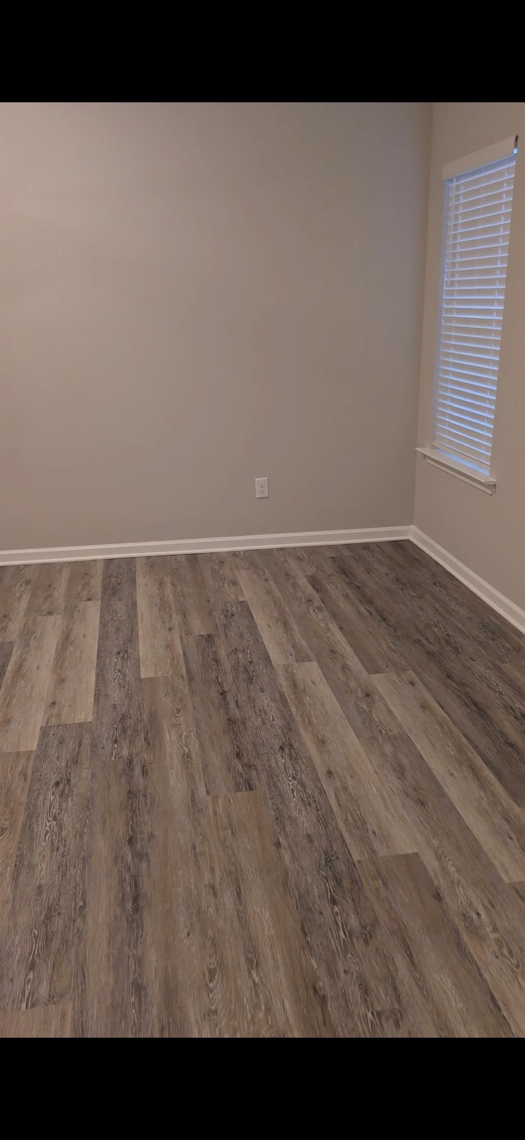 10160 Sterling Ridge Drive Cordova, TN 38018 - Photo 16 of 35 a view of an empty room with wooden floor