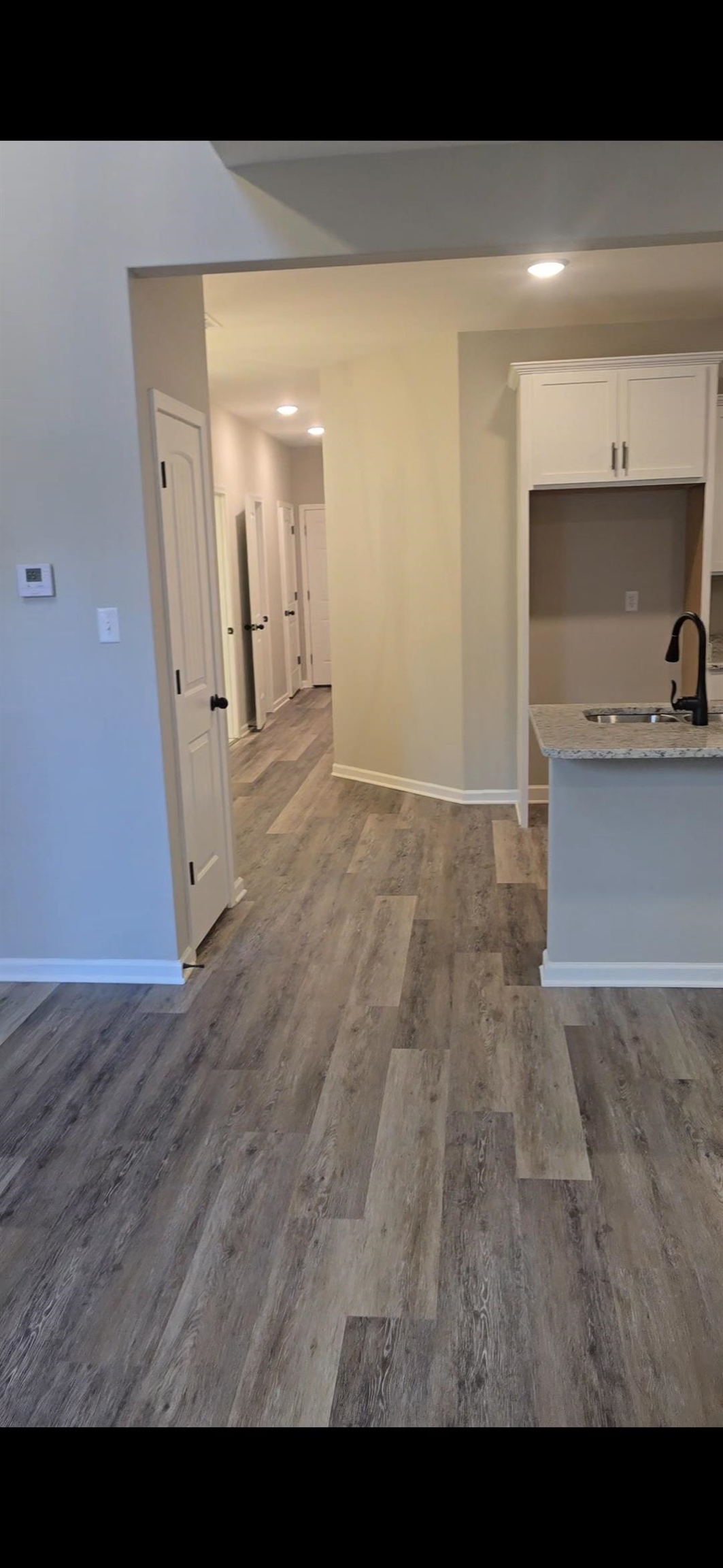 10160 Sterling Ridge Drive Cordova, TN 38018 - Photo 20 of 35 a view of a kitchen cabinets and a wooden floor