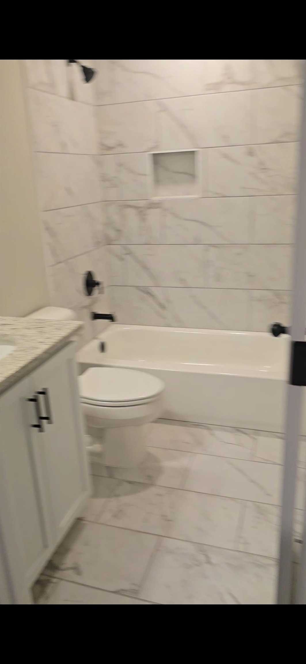 10160 Sterling Ridge Drive Cordova, TN 38018 - Photo 23 of 35 a bathroom with a toilet a sink and view