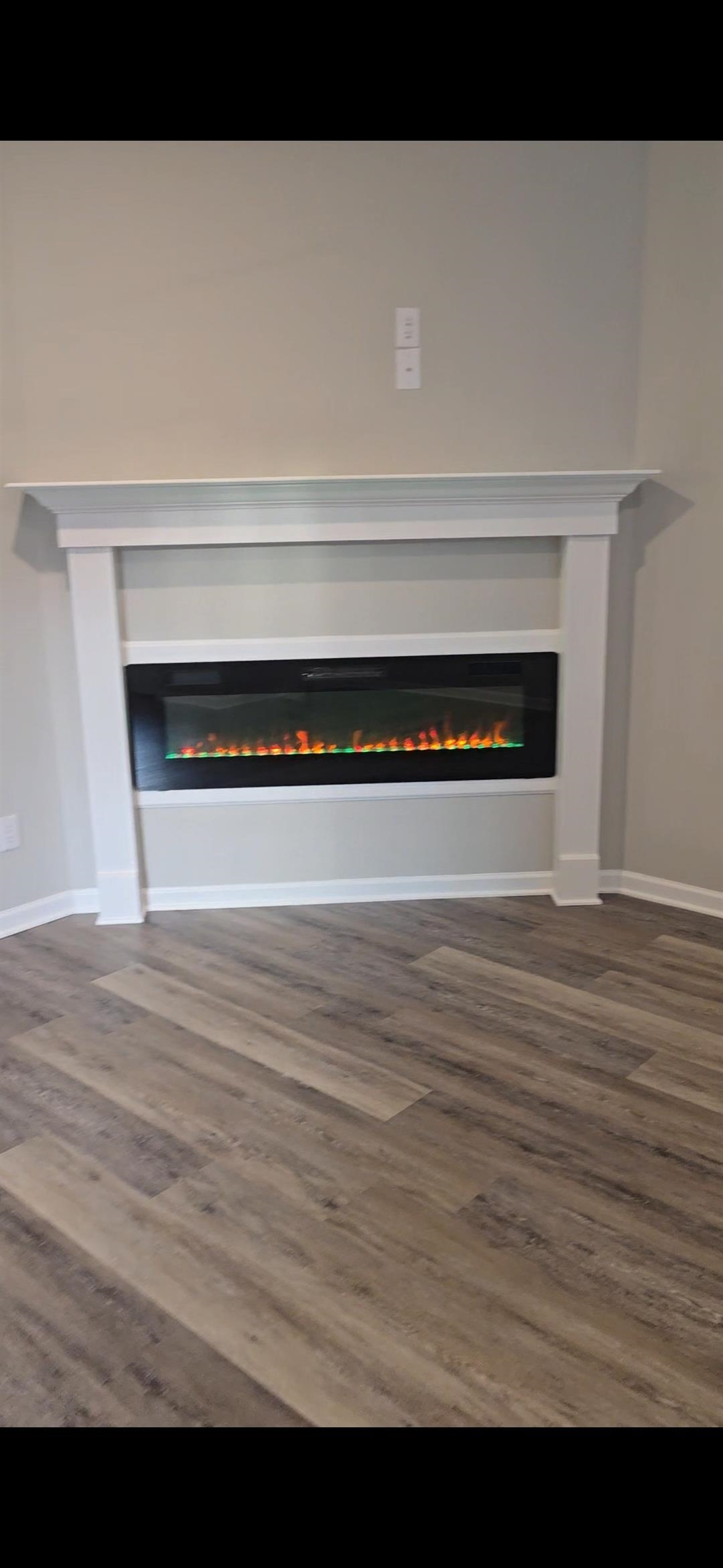 10160 Sterling Ridge Drive Cordova, TN 38018 - Photo 30 of 35 a view of a room with wooden floor and a fireplace