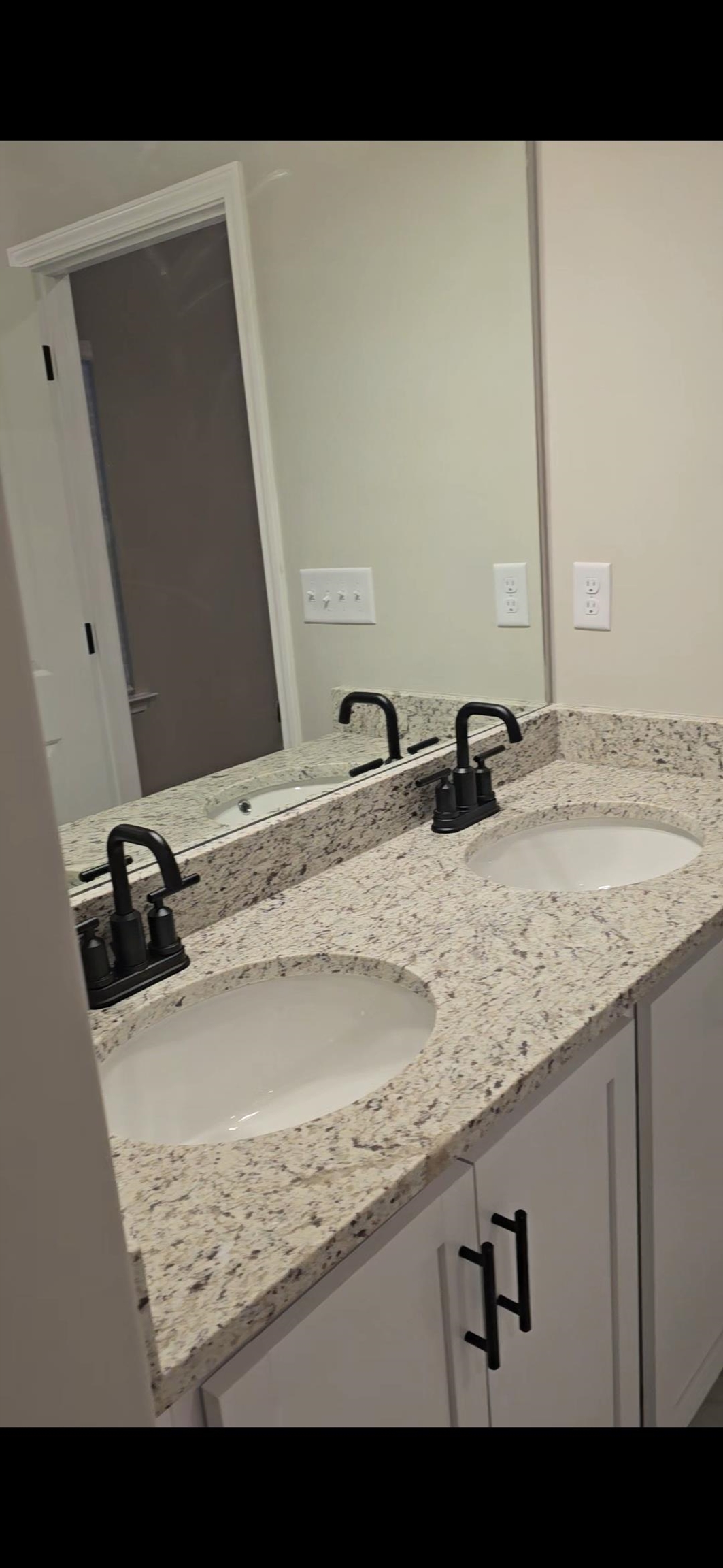 10160 Sterling Ridge Drive Cordova, TN 38018 - Photo 32 of 35 a bathroom with a sink and a mirror