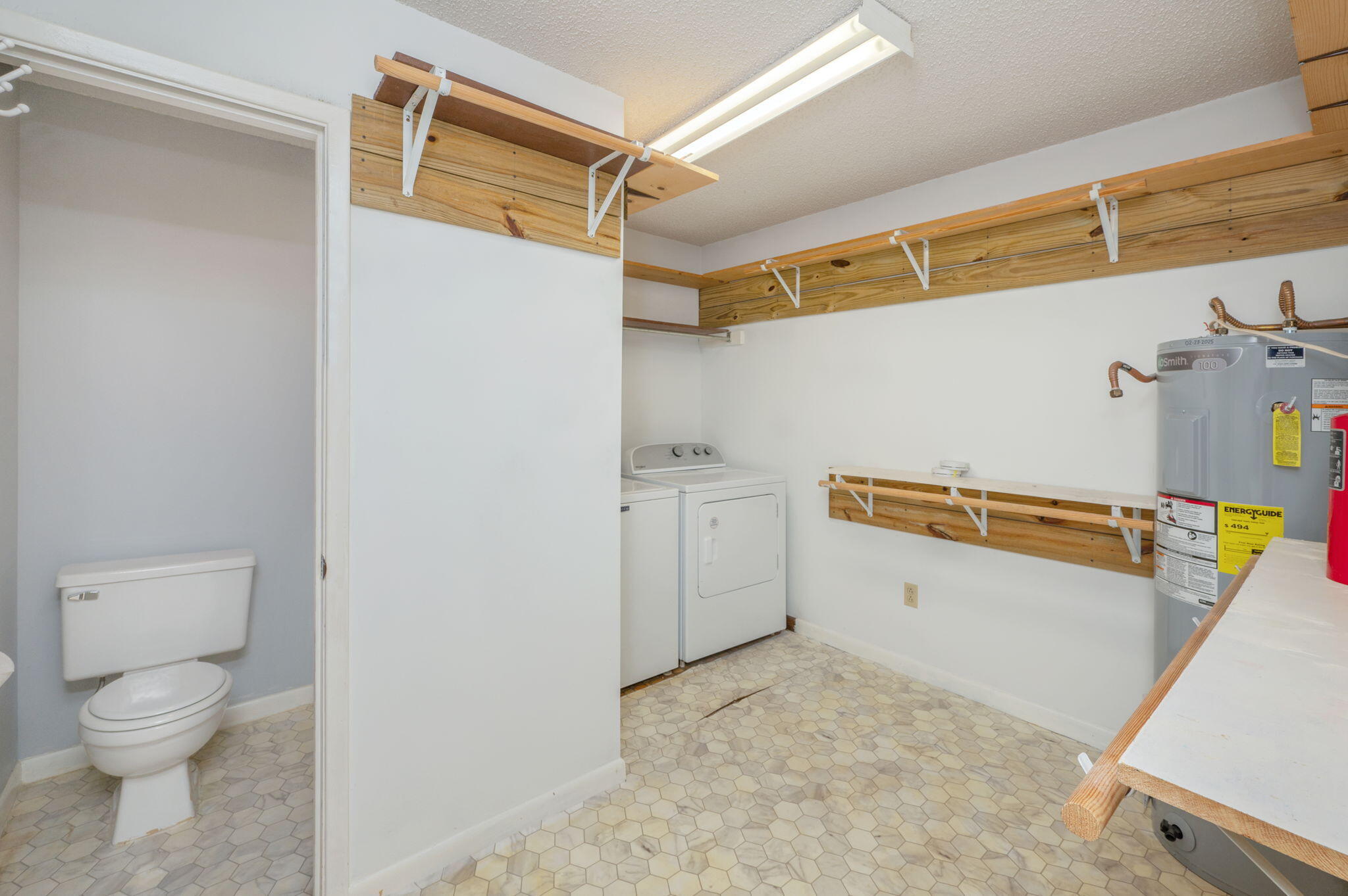 5770 Wildwood Road Crestview, FL 32536 - Photo 29 of 39 a view of a storage & utility room with a sink