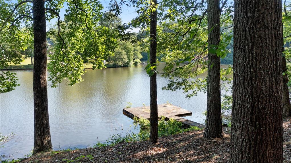 24 Commerce Row Northeast Cartersville, GA 30121 - Photo 4 of 37 a view of a lake from a balcony