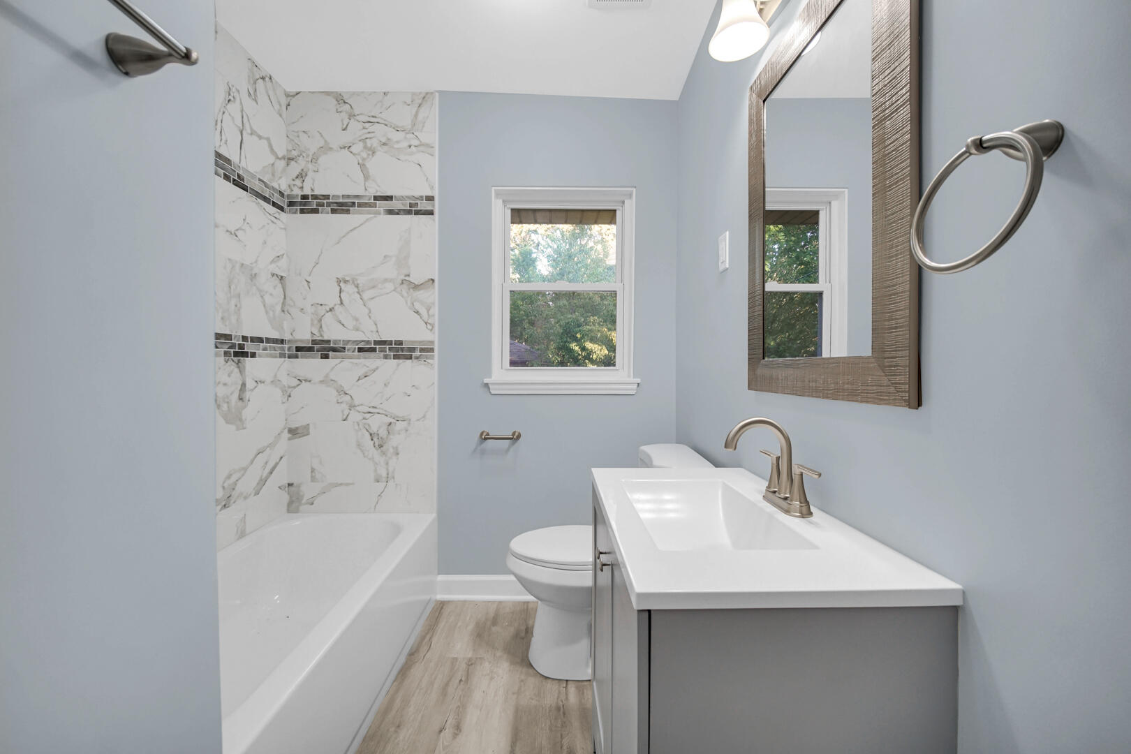 3816 Lincoln Street Gary, IN 46408 - Photo 11 of 21 a bathroom with a sink toilet and shower