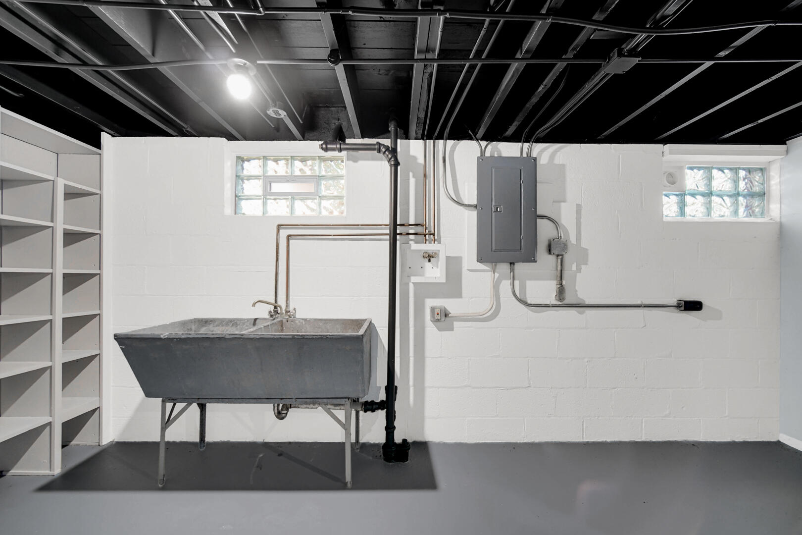 3816 Lincoln Street Gary, IN 46408 - Photo 18 of 21 a room with water heater and a table