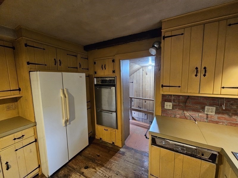 23 High Street Monson, MA 01057 - Photo 11 of 29 a kitchen with a refrigerator and a sink