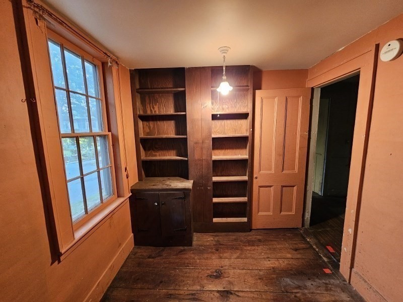 23 High Street Monson, MA 01057 - Photo 16 of 29 a view of walk in closet with empty racks