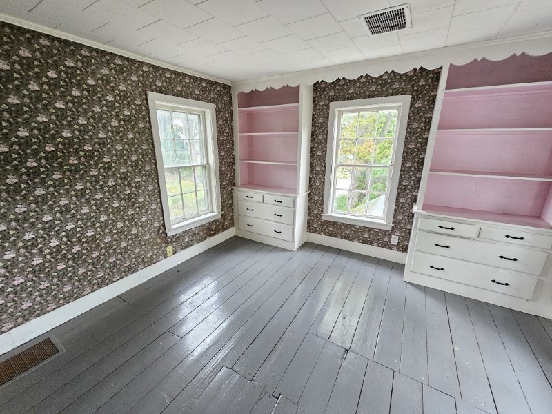 23 High Street Monson, MA 01057 - Photo 23 of 29 wooden floor in an empty room with a window