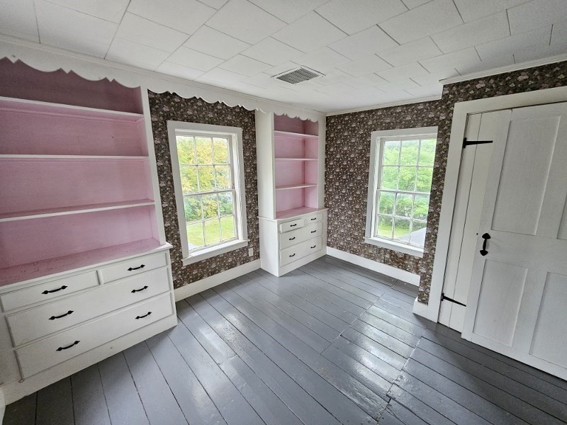 23 High Street Monson, MA 01057 - Photo 24 of 29 a view of room with window and wooden floor