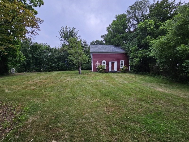 23 High Street Monson, MA 01057 - Photo 29 of 29 a view of a house with a yard