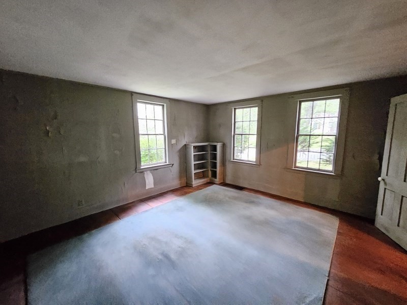 23 High Street Monson, MA 01057 - Photo 5 of 29 an empty room with windows