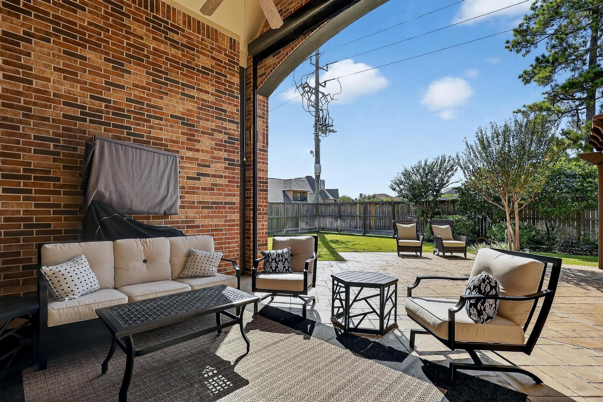 25803 Heritage Maple Drive Spring, TX 77389 - Photo 17 of 46 a view of an outdoor sitting area with furniture and wooden floor