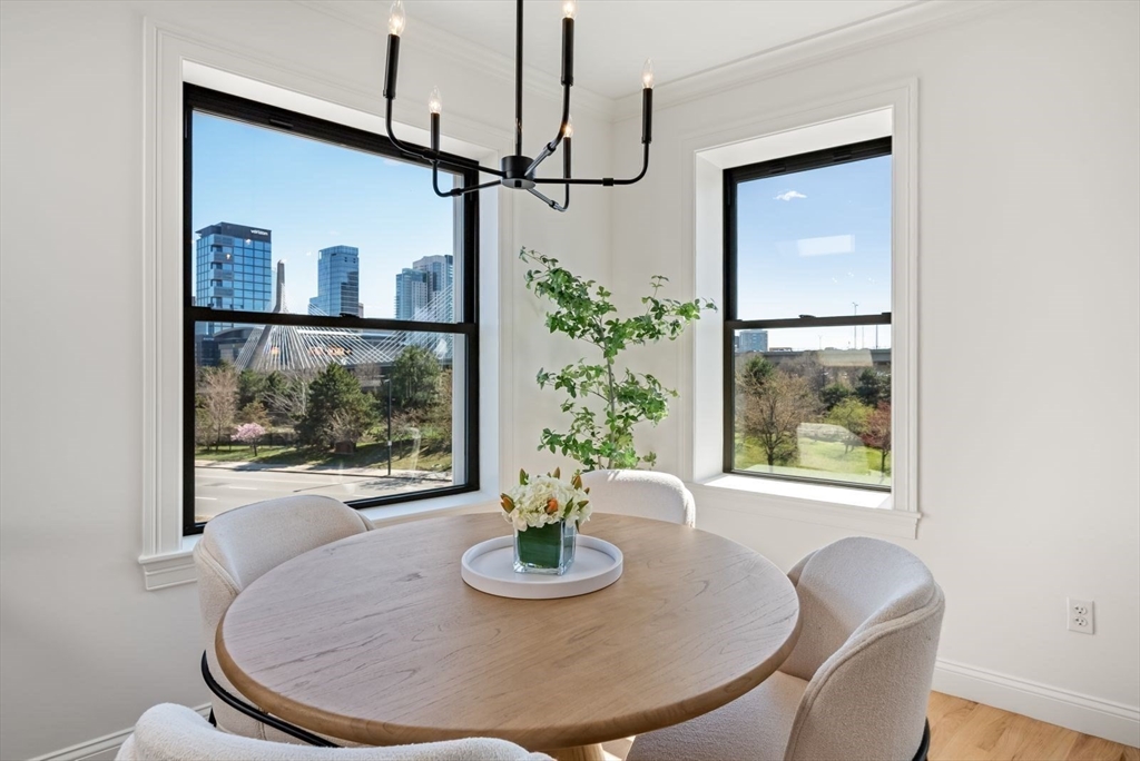 35 Rutherford Avenue, Unit 3 Boston, MA 02129 - Photo 9 of 28 a view of a dining room with furniture window and wooden floor