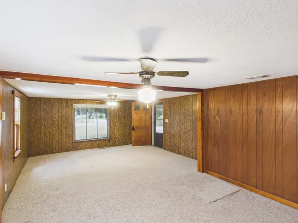 a view of a livingroom with a staircase