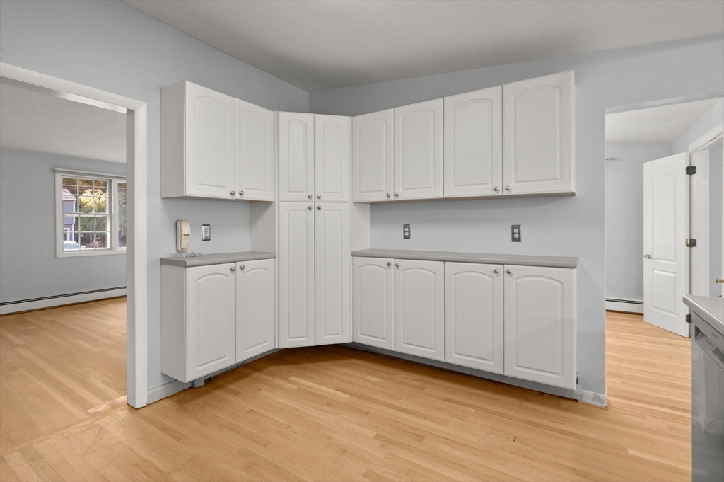 10 Strawberry Hill Road Andover, MA 01810 - Photo 16 of 41 a view of cabinets and wooden floor
