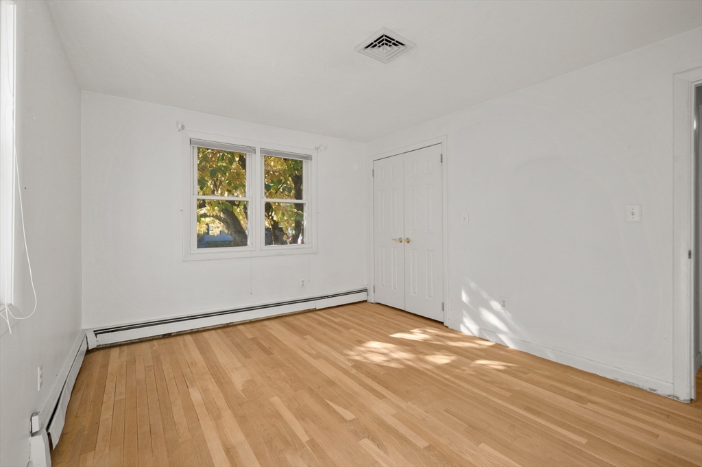 10 Strawberry Hill Road Andover, MA 01810 - Photo 25 of 41 an empty room with a window