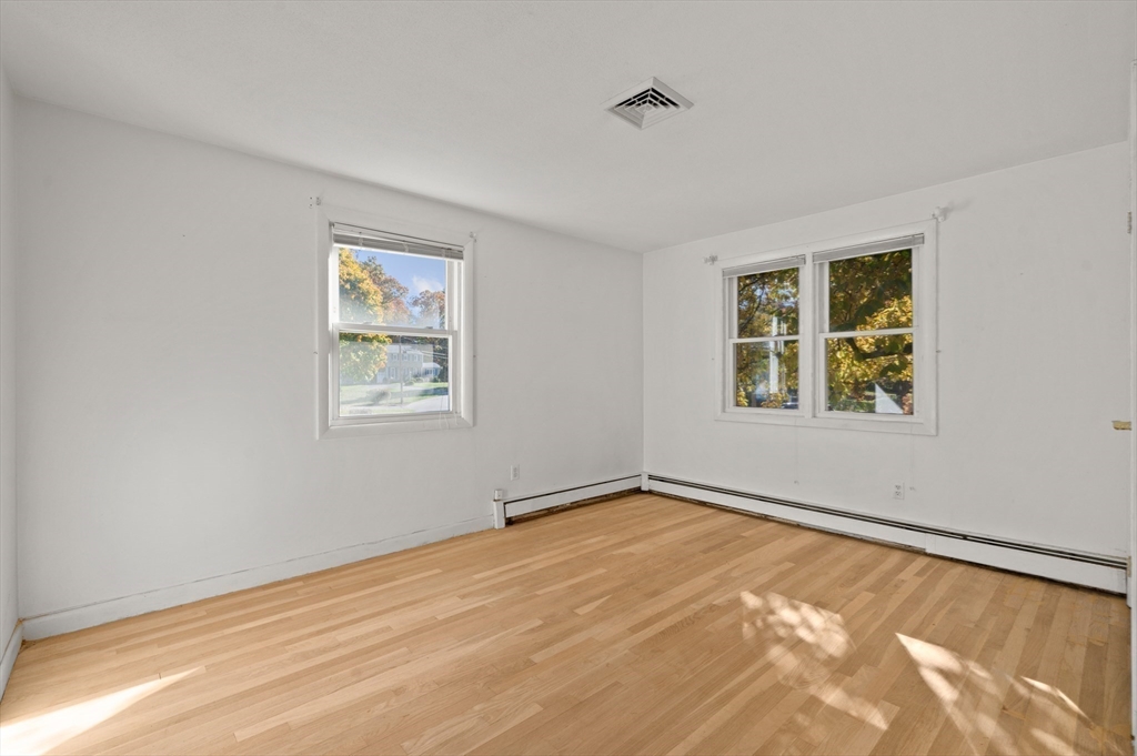 10 Strawberry Hill Road Andover, MA 01810 - Photo 26 of 41 a view of an empty room with a window