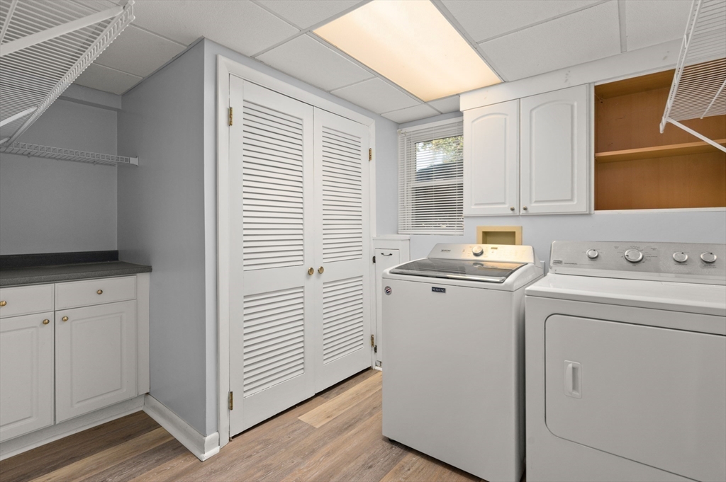 10 Strawberry Hill Road Andover, MA 01810 - Photo 31 of 41 a utility room with dryer and washer