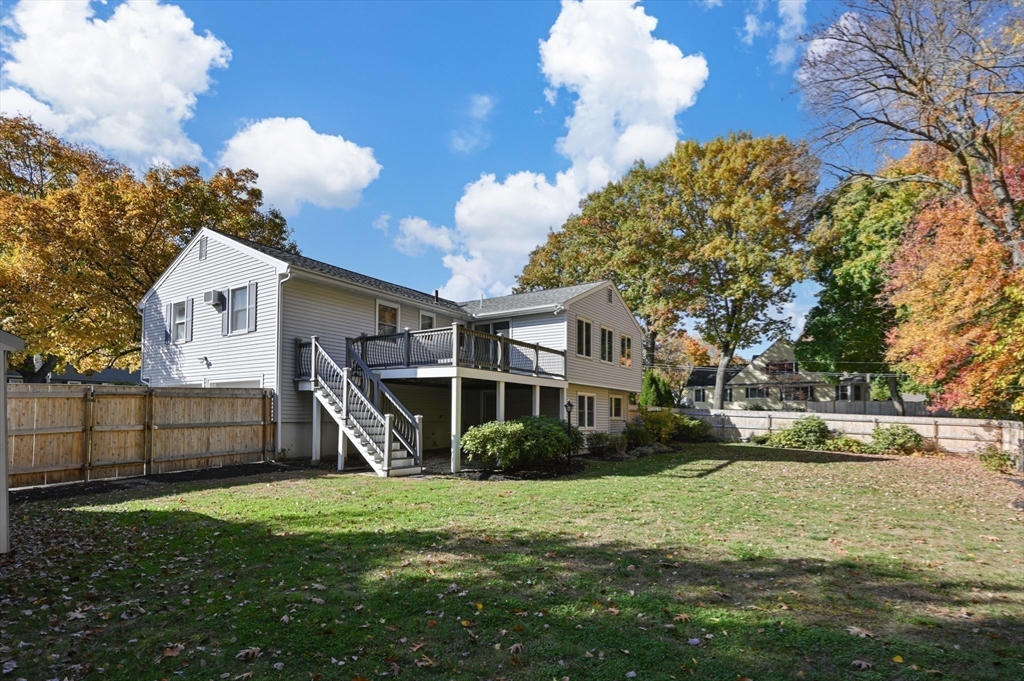 10 Strawberry Hill Road Andover, MA 01810 - Photo 38 of 41 a front view of a house with a yard