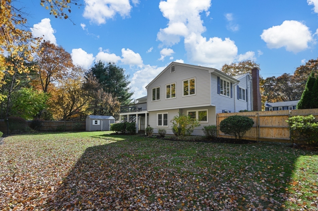 10 Strawberry Hill Road Andover, MA 01810 - Photo 39 of 41 a view of a house with a garden