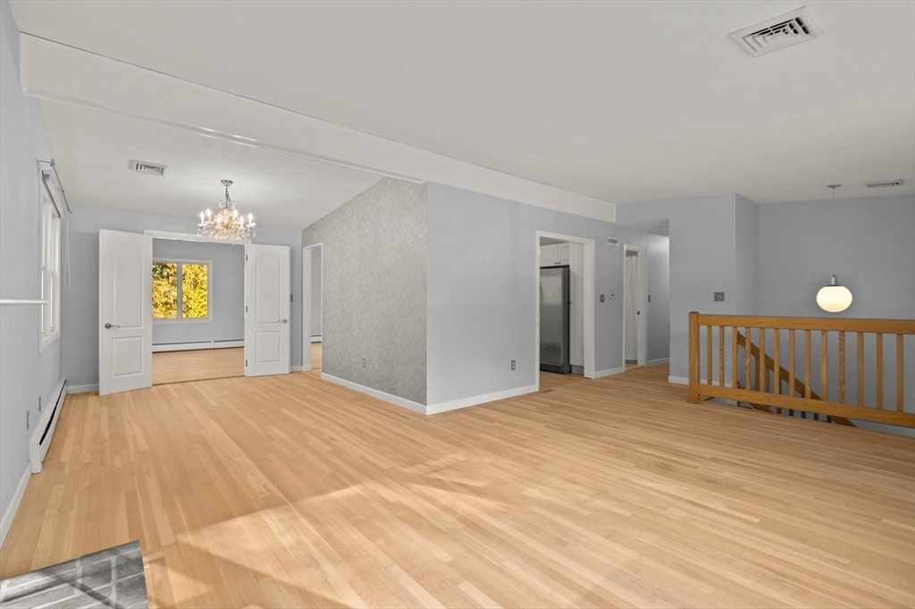 10 Strawberry Hill Road Andover, MA 01810 - Photo 7 of 41 a view of an empty room and a window