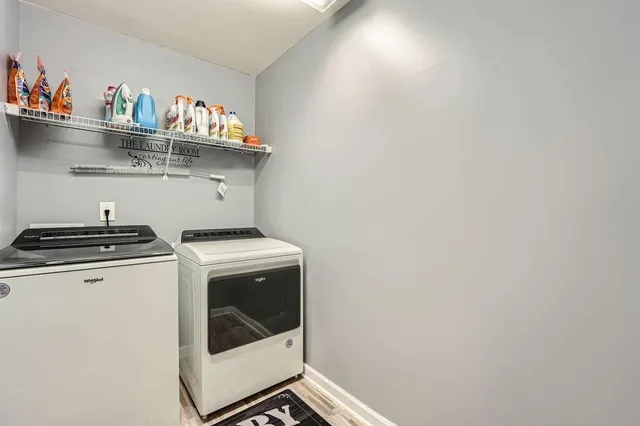 a utility room with dryer and washer