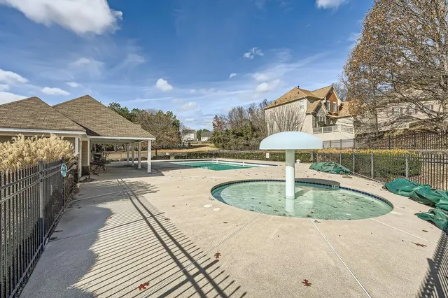 a view of outdoor space and swimming pool