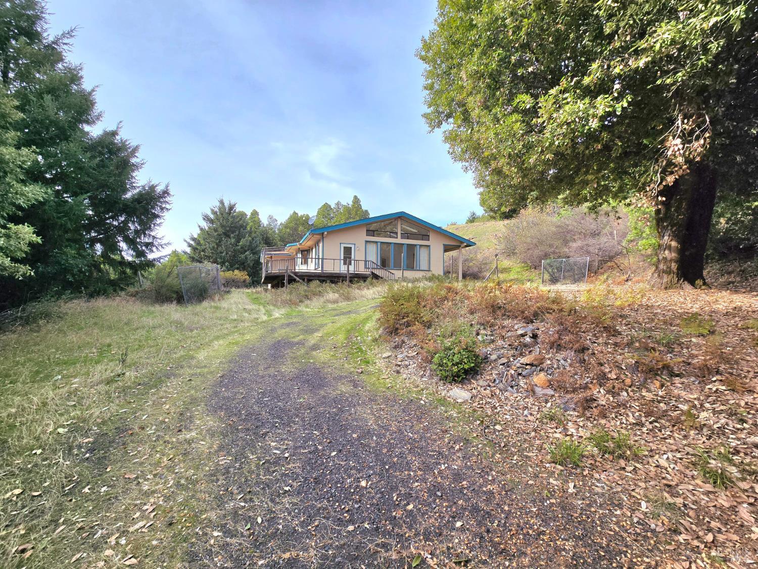 36955 Eureka Stagecoach Road Willits, CA 95490 - Photo 4 of 46 a view of a house with a yard