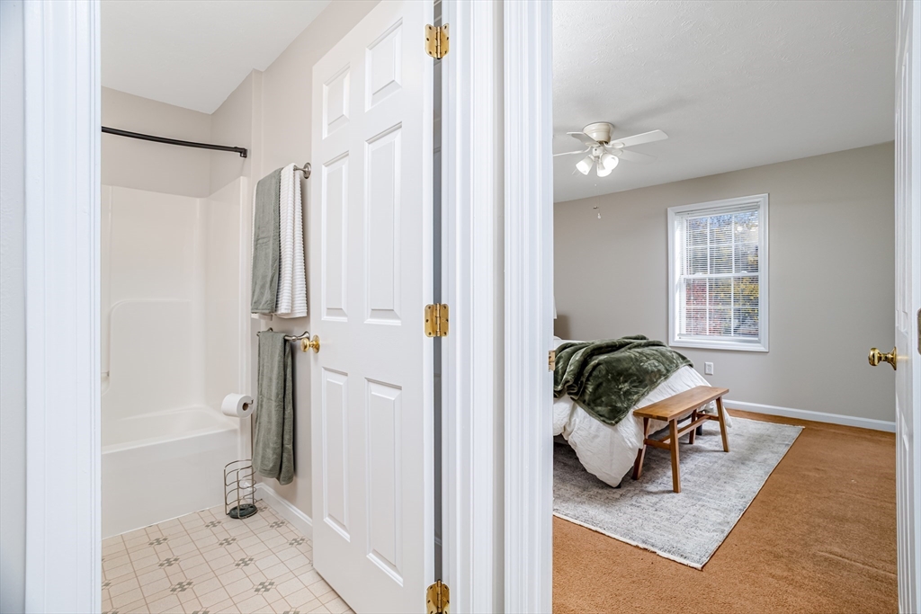 104 Lake Street, Unit 104 Gardner, MA 01440 - Photo 18 of 30 a living room with furniture and a large window