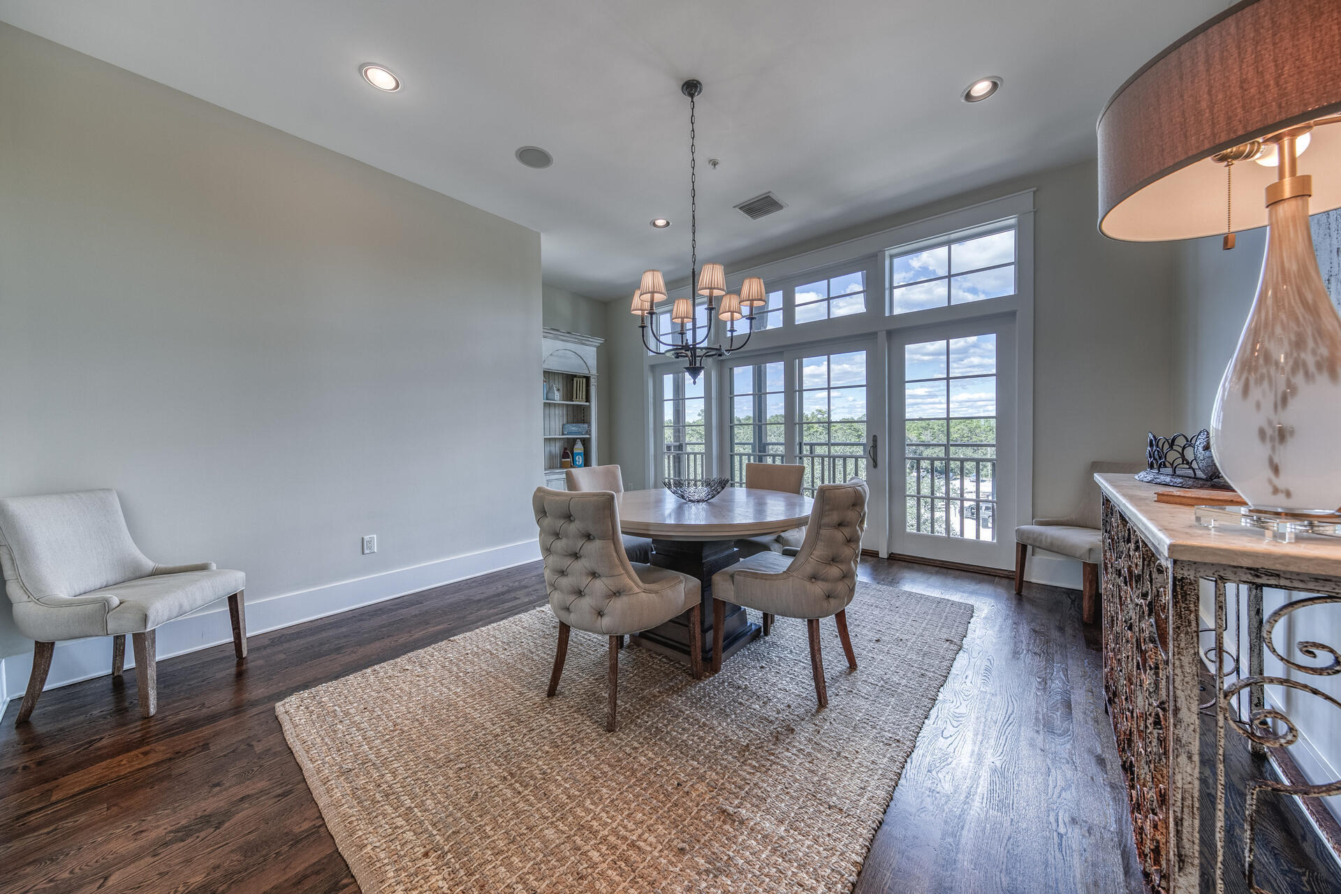 5231 East County Highway 30A, Unit E Santa Rosa Beach, FL 32459 - Photo 17 of 41 a view of a dining room with furniture window and wooden floor