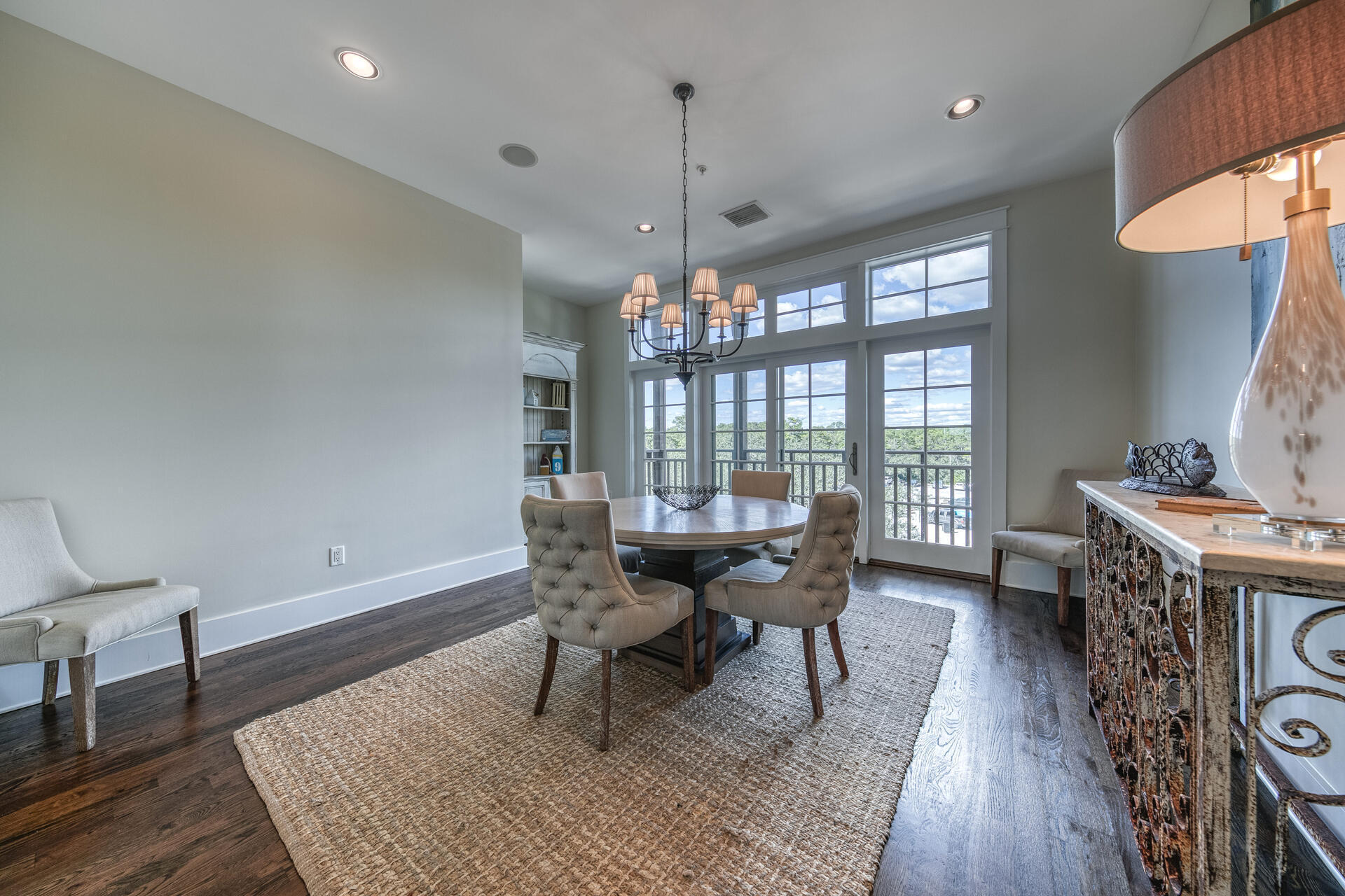 5231 East County Highway 30A, Unit E Santa Rosa Beach, FL 32459 - Photo 18 of 41 a view of a dining room with furniture window and wooden floor
