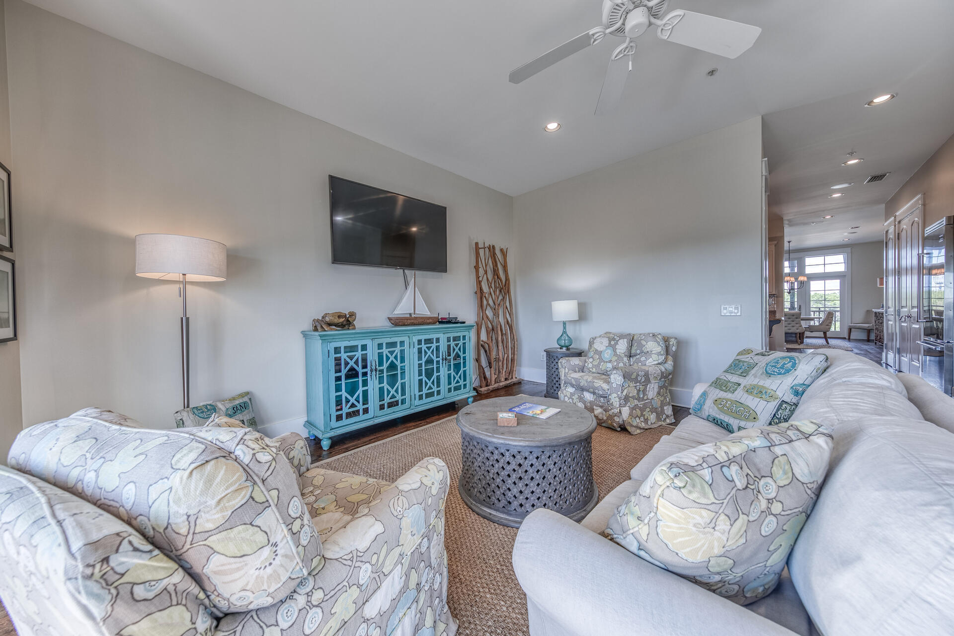 5231 East County Highway 30A, Unit E Santa Rosa Beach, FL 32459 - Photo 24 of 41 a living room with furniture and a flat screen tv