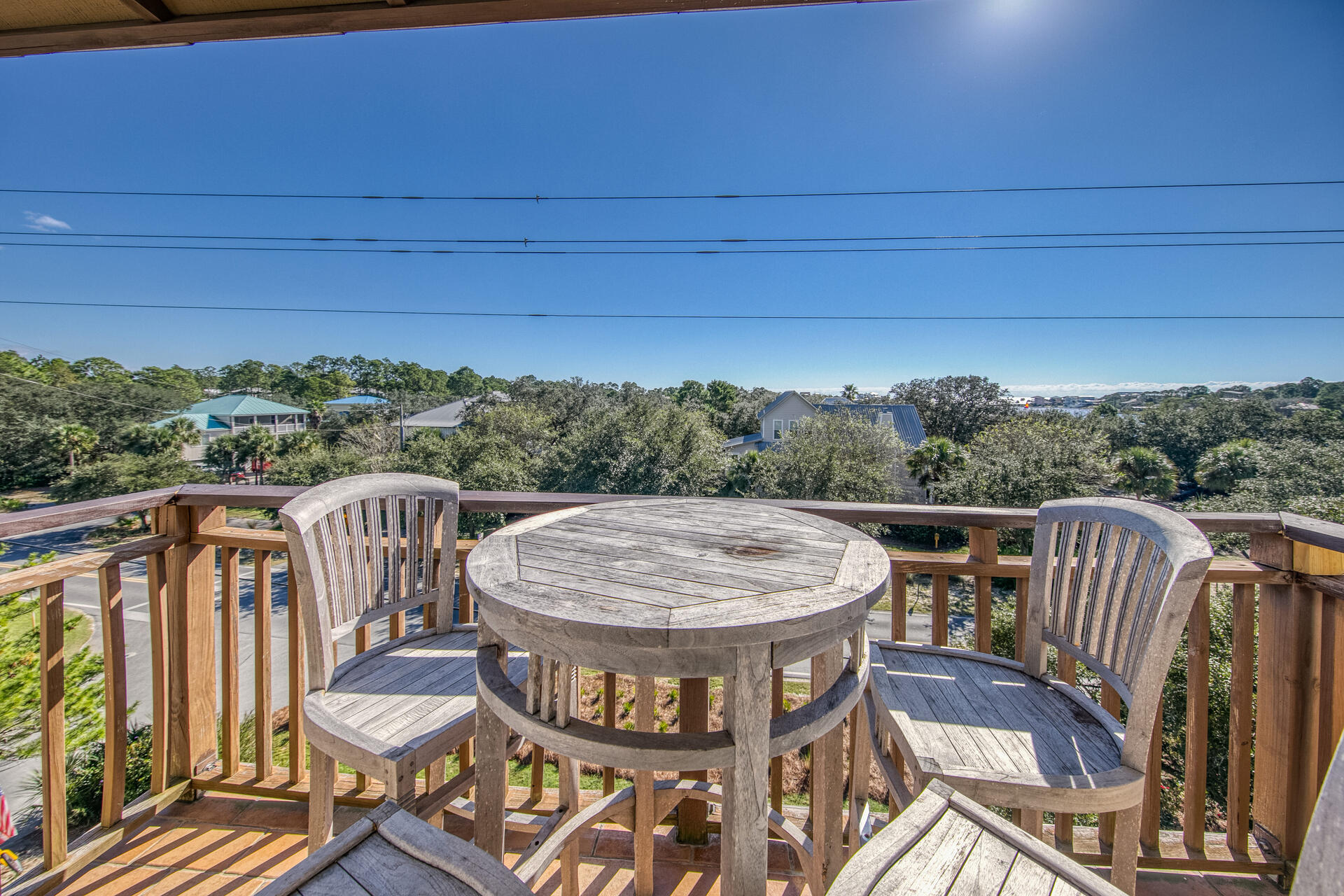 5231 East County Highway 30A, Unit E Santa Rosa Beach, FL 32459 - Photo 29 of 41 a view of a chairs and table in the balcony
