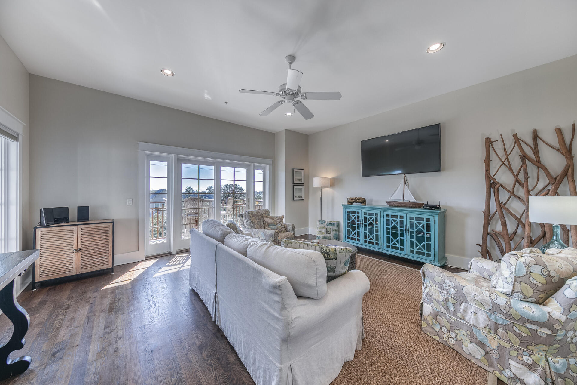 5231 East County Highway 30A, Unit E Santa Rosa Beach, FL 32459 - Photo 30 of 41 a living room with furniture and a flat screen tv