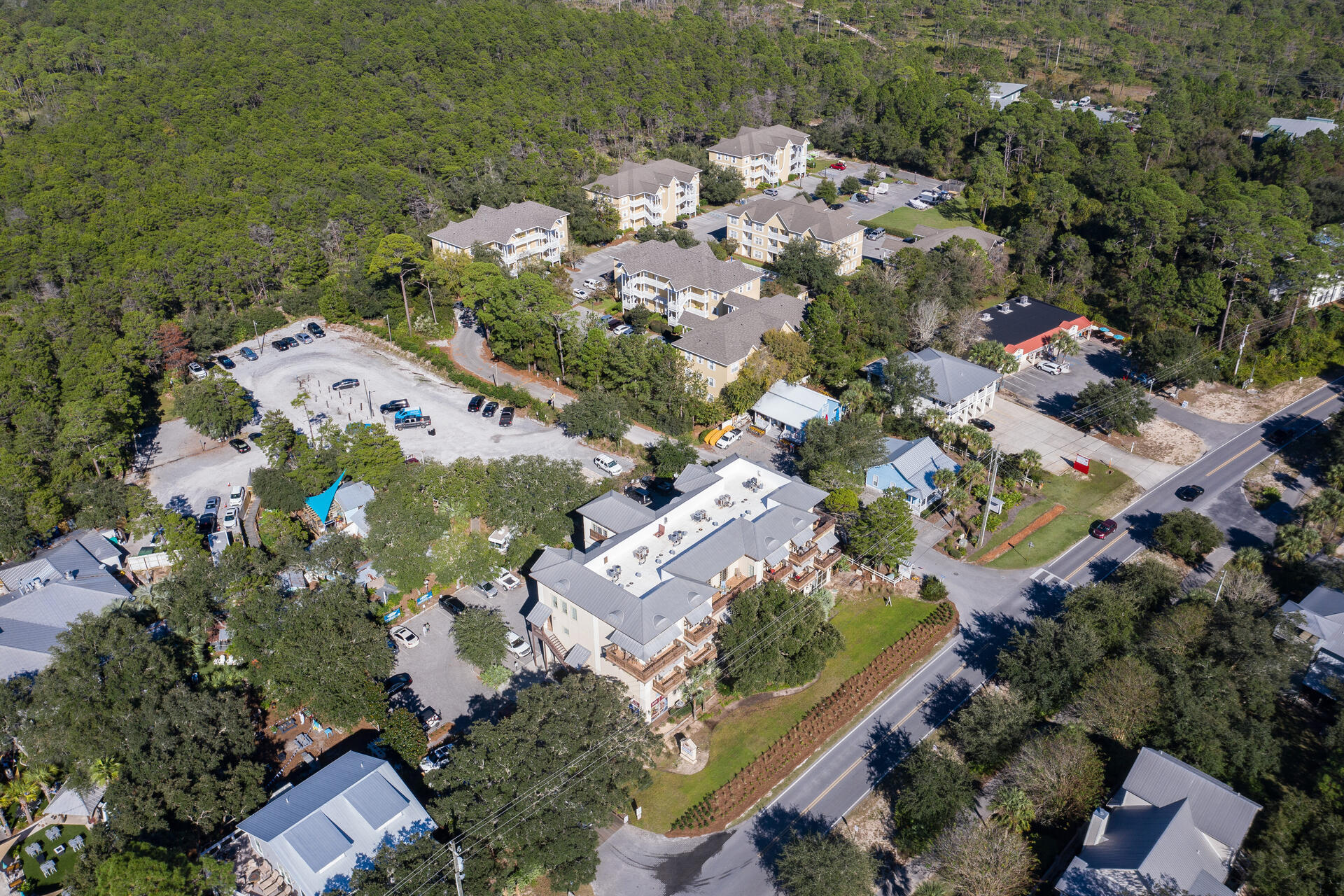 5231 East County Highway 30A, Unit E Santa Rosa Beach, FL 32459 - Photo 37 of 41 an aerial view of multiple house with yard