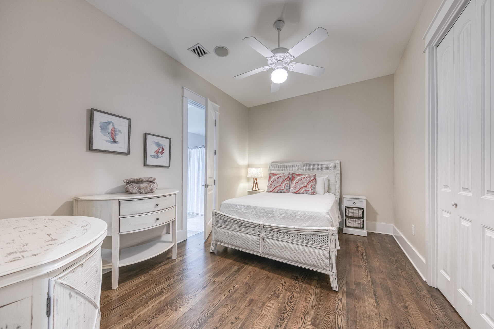 5231 East County Highway 30A, Unit E Santa Rosa Beach, FL 32459 - Photo 7 of 41 a bedroom with a bed and a chandelier