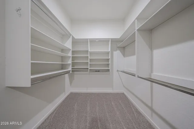 a view of a hallway with a furniture