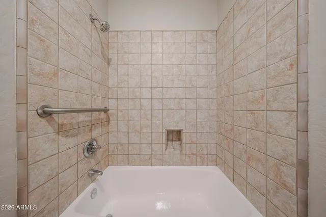 a kitchen with a sink cabinets and window