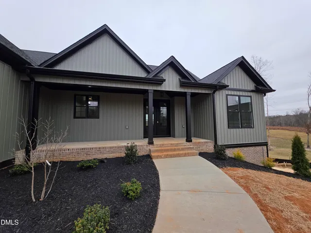 a front view of a house with porch