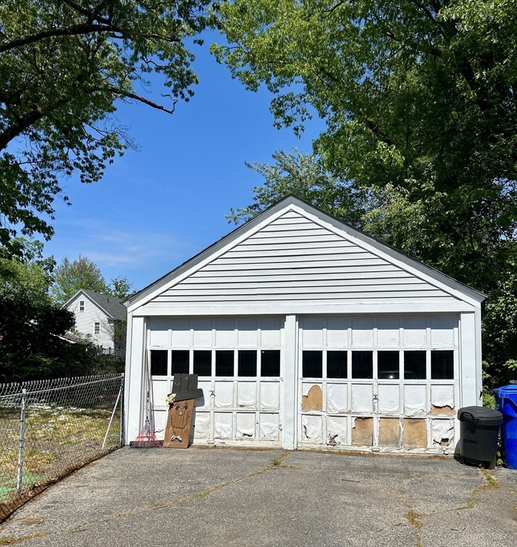 153 Carver Street Springfield, MA 01108 - Photo 3 of 22 a view of a house with a yard