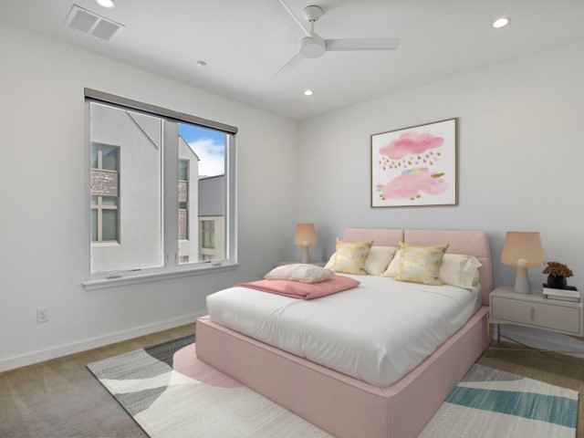 2506 Sutherland Street Austin, TX 78746 - Photo 11 of 17 a bedroom with a bed and a painting on the wall